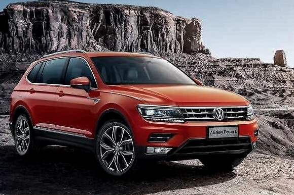 手握25万，优惠大的加长途观和2.0T动力的冒险家怎么选？