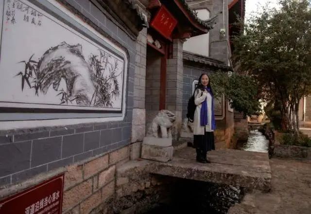 三坊一照壁是丽江古城的经典民居形式之一.