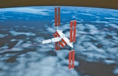 在北京航天飞行控制中心拍摄的天舟五号货运飞船与空间站组合体完成自主快速交会对接示意图。孙丰晓摄（新华社发）