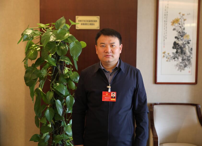 江西省人大代表,贵溪市委副书记,市长周谷昌