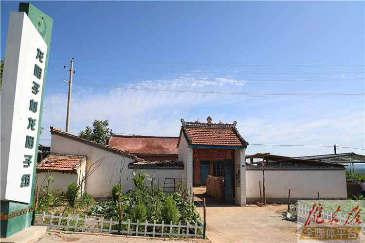 水泥路通门口 龙咀子村大变样