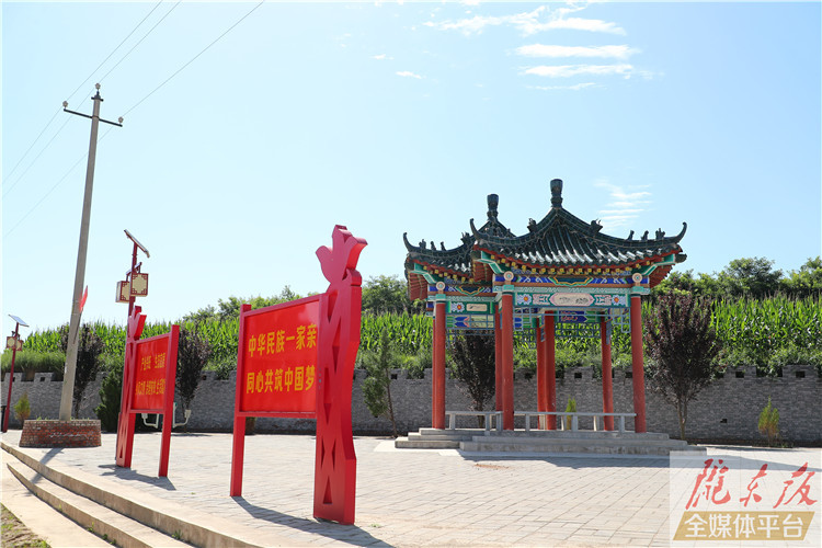 水泥路通门口 龙咀子村大变样