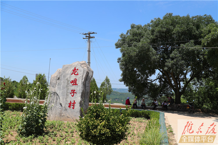 水泥路通门口 龙咀子村大变样