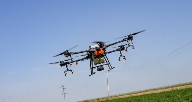 大疆植保无人机帮助新疆农民收入翻倍__凤凰网