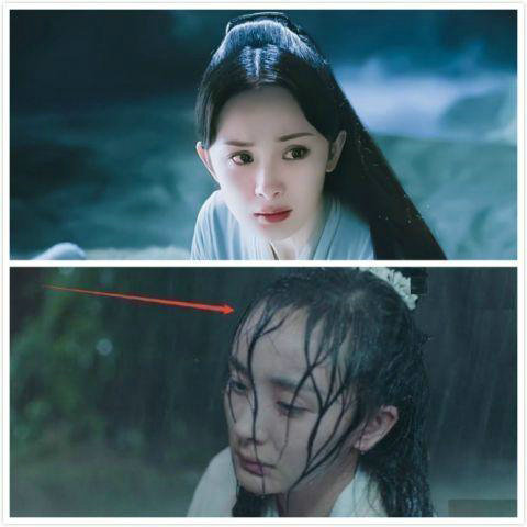 雨水淋湿杨幂的头发,发际线便会展露,硬生生抢了观众的目光.