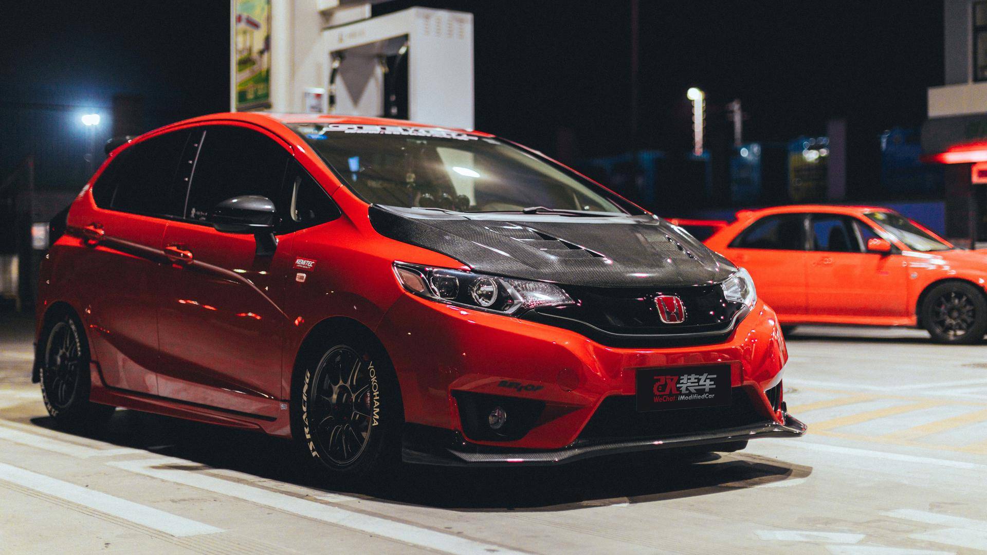 新车也能兑现情怀骚红飞度gk5竞技性能改装