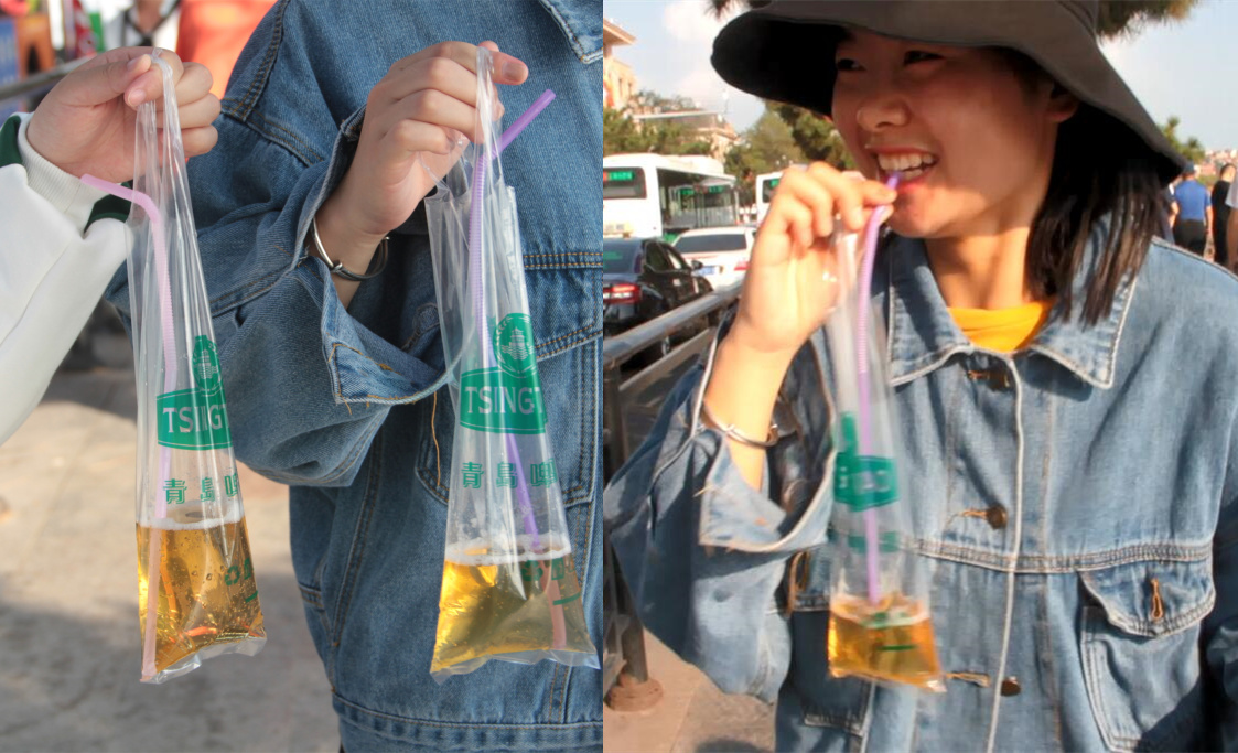 青岛小袋装啤酒走红女游客边走边用吸管喝