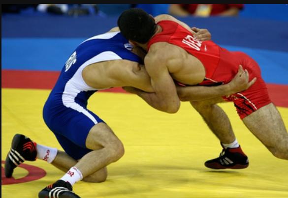 双腋下握颈动作禁止在女子摔跤