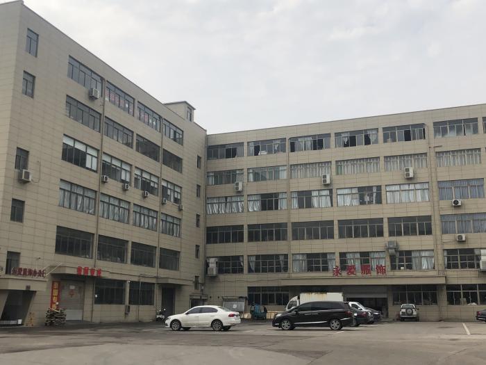 （21世纪经济报道记者朱艺艺摄：浙江永爱服饰有限公司）