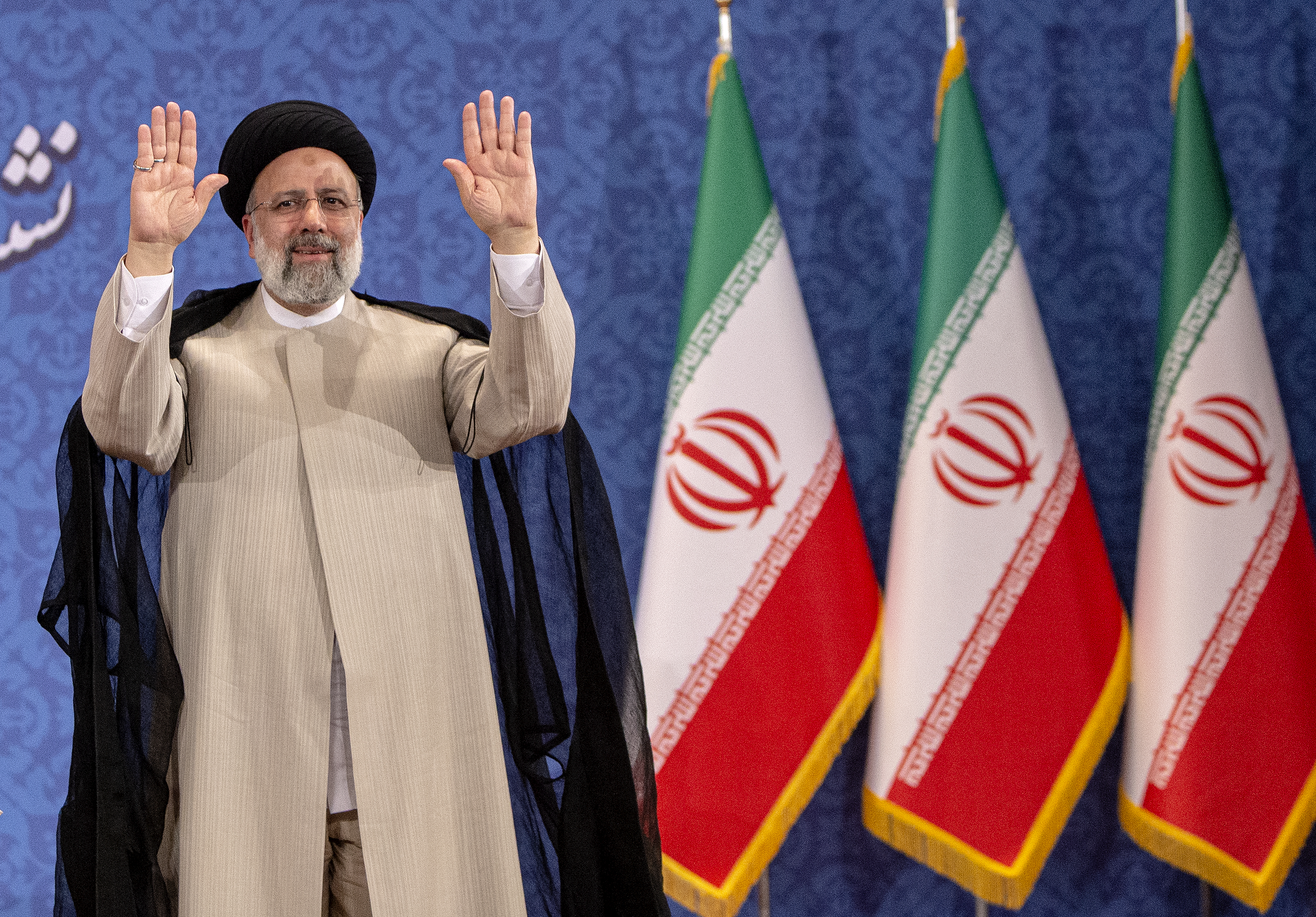 6月21日，伊朗当选总统易卜拉欣·莱希在德黑兰出席当选后的首场新闻发布会。新华社发（艾哈迈德·哈拉比萨斯摄）