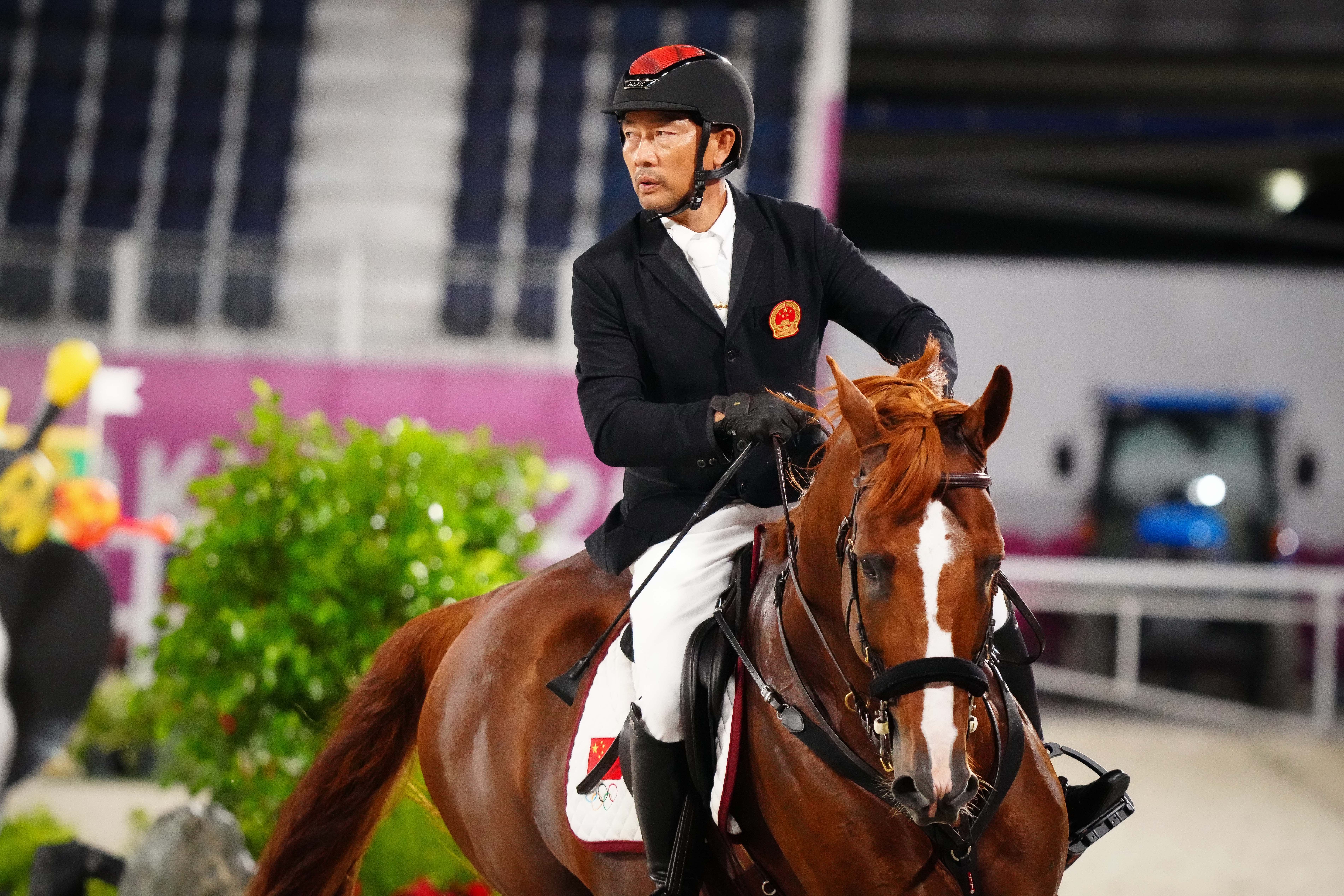 52岁的李振强在比赛中。