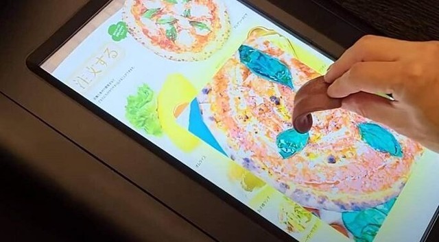 这块屏幕当真可以舔 有味 是食物的味道