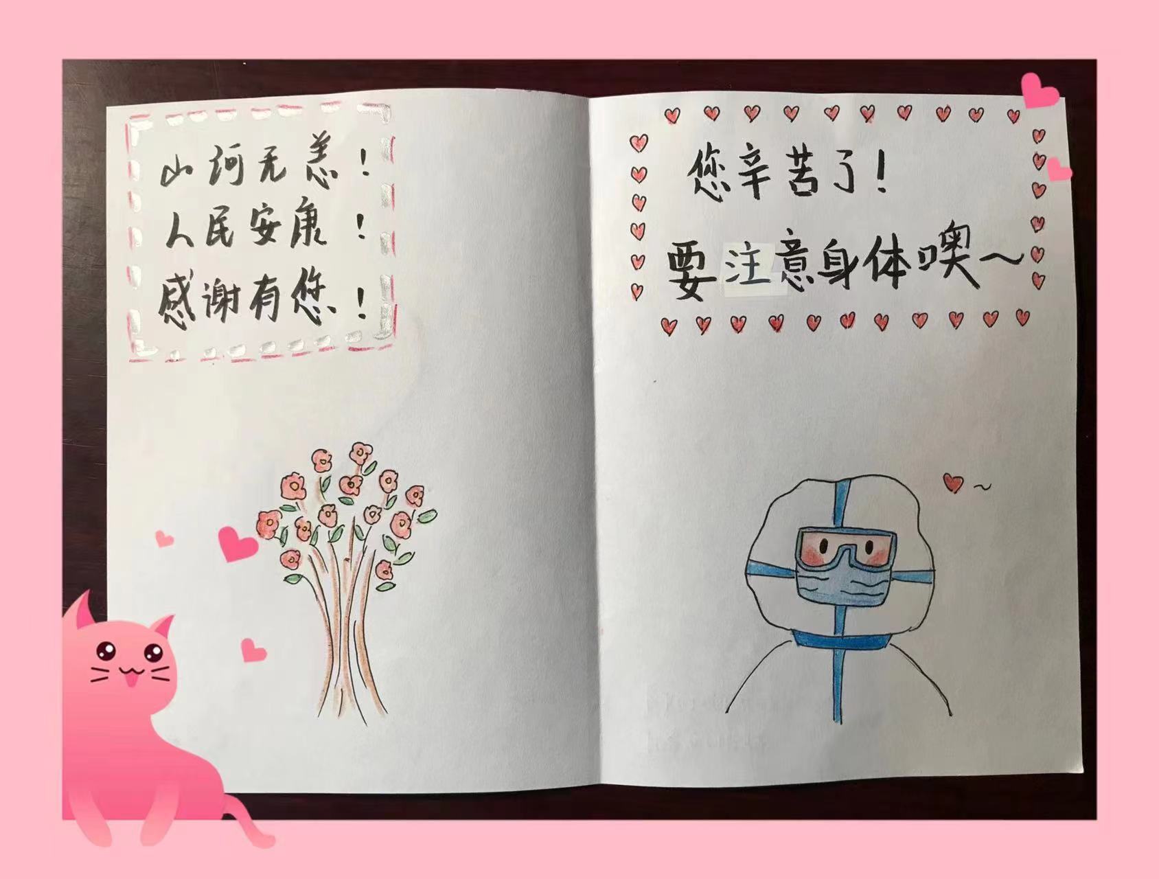 洋桥西里社区的孩子在收到礼物后，绘制图画表达感谢。 受访者供图