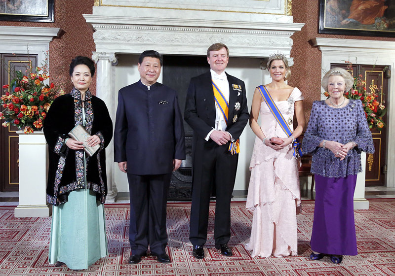 2014年3月22日，国家主席习近平在阿姆斯特丹会见荷兰国王威廉－亚历山大。