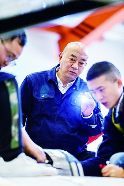 工作中的C919研制团队。资料图片