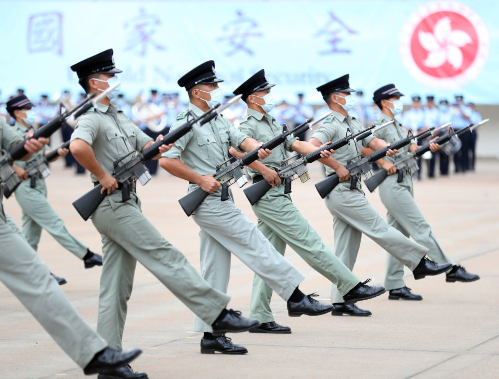 2021年4月14日,在香港警察学院,香港警察仪仗队在进行中式步操训练.