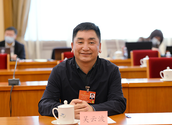 吴云波在北京人民大会堂出席十三届全国人大五次会议.