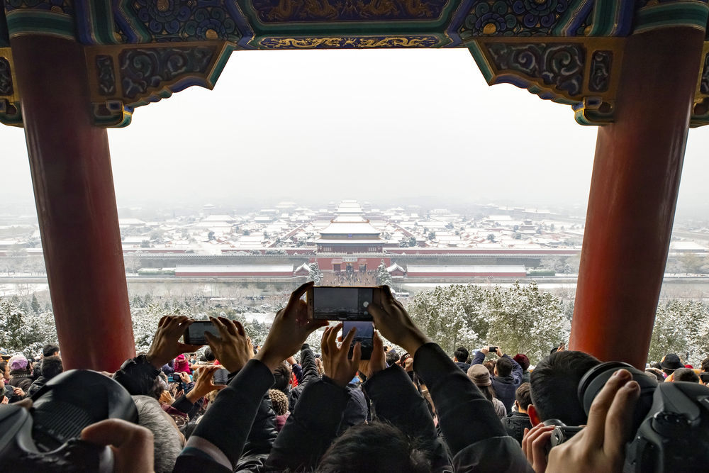 景山公园看故宫雪景图片