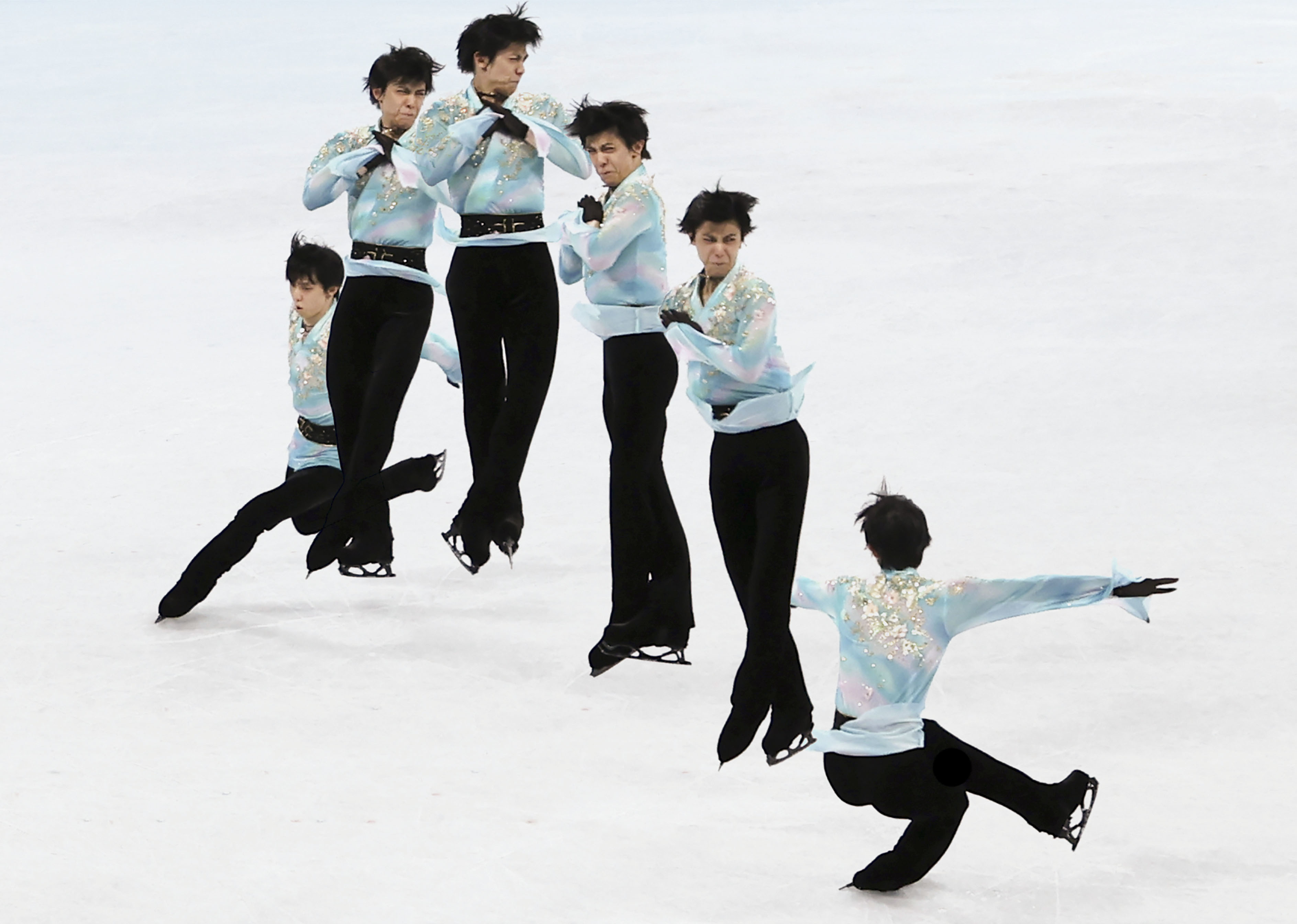 2月10日，日本选手羽生结弦在比赛中尝试阿克塞尔四周跳（拼接照片）。新华社记者 曹灿 摄