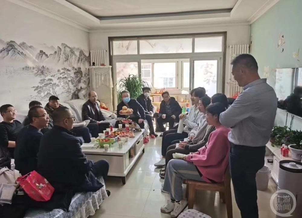 ▲家访现场照片。