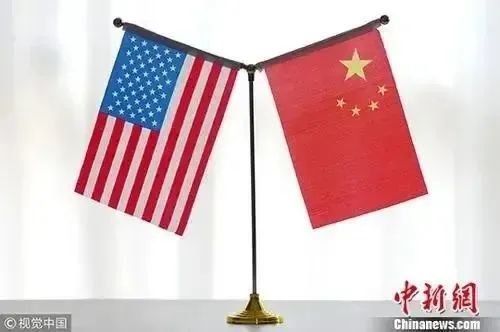 资料图：中美国旗。图片来源：视觉中国
