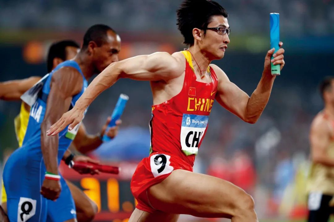 2008年8月21日，北京奥运会男子4x100米接力赛，清华大学学生胡凯代表中国队出战并跑出39.13秒，晋级决赛。摄影/本刊记者 盛佳鹏