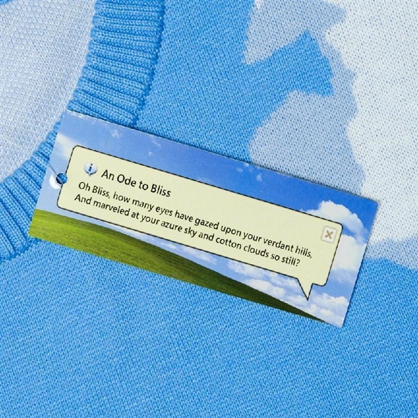 微软推出2023款“丑”毛衣:基于WinXP经典蓝天白云壁纸