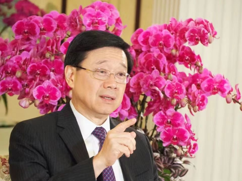 李家超谈香港最大吸引力。香港中通社 记者洪少葵摄