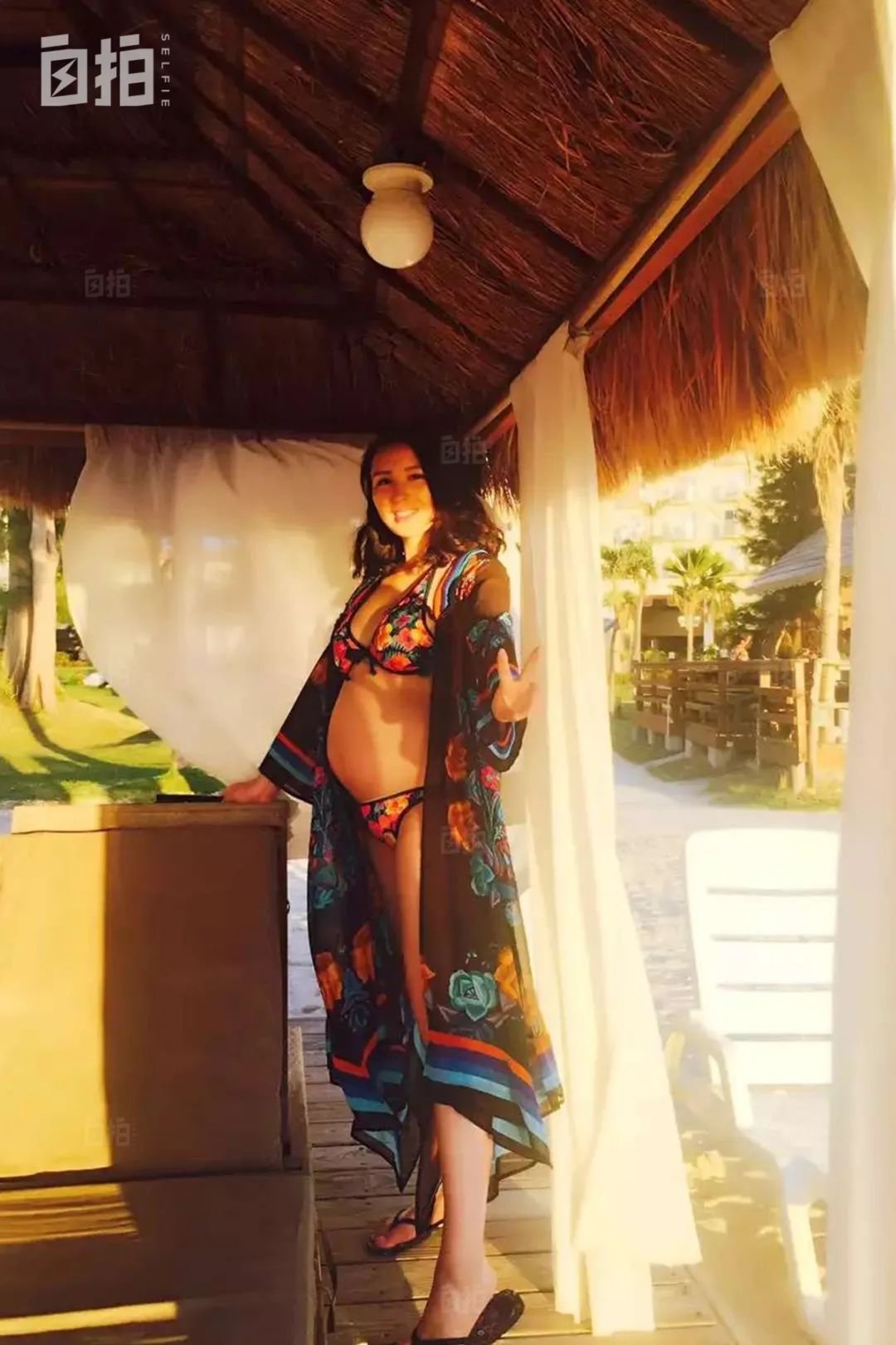 我一直非常爱美,包括怀孕的时候,在塞班,心情好我就会出去拍几张美照。