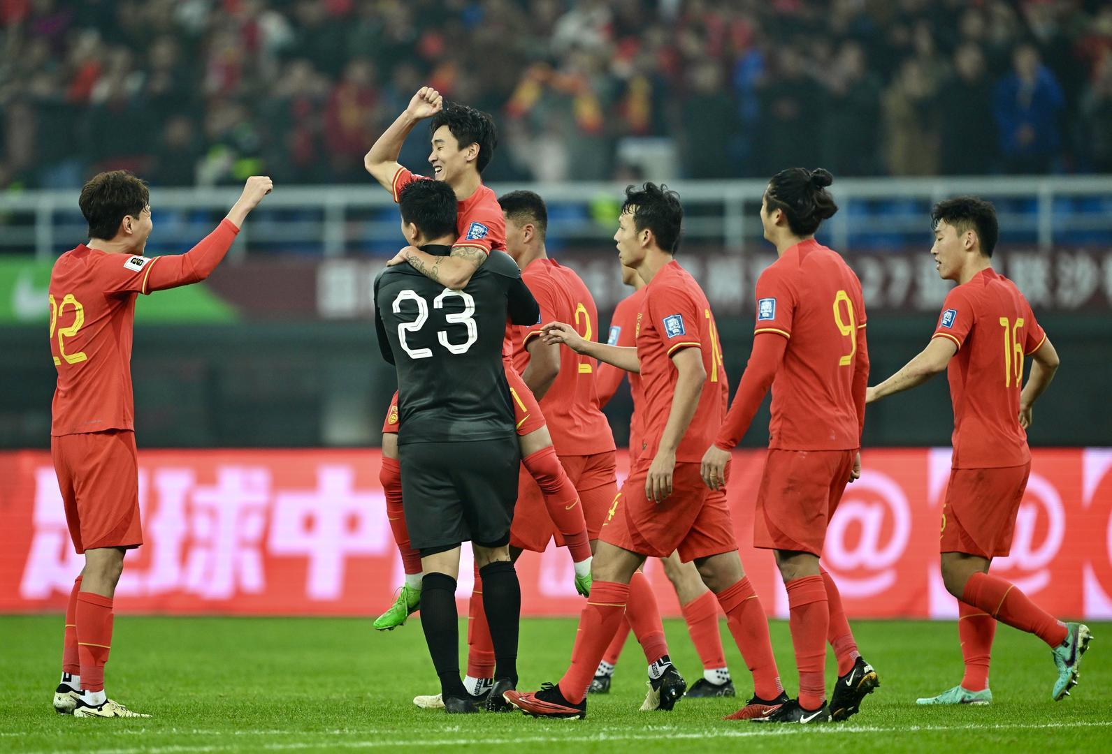 中国队队员庆祝进球 图据视觉中国