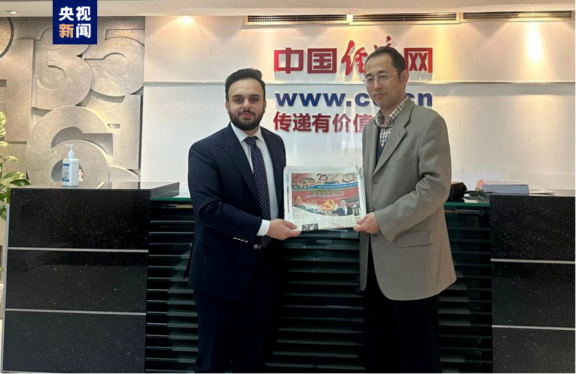 △塔希尔的儿子马里杰参观中国经济网