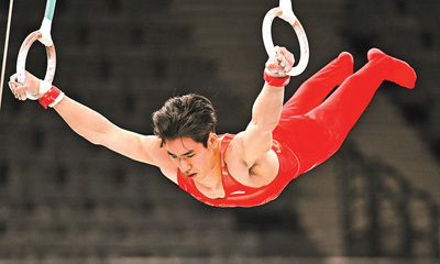 巴黎当地时间7月24日，中国体育代表团男子体操选手刘洋在进行赛前训练。新华社记者 程 敏摄