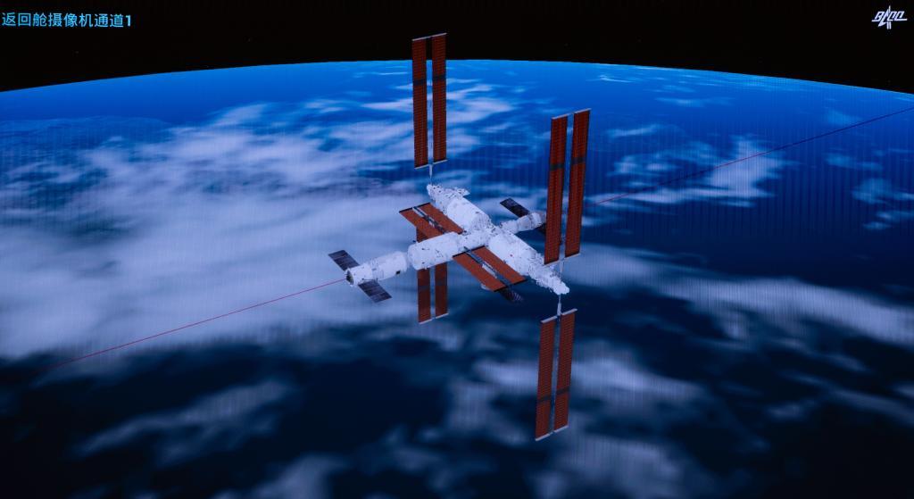 2023年10月26日在北京航天飞行控制中心拍摄的神舟十七号载人飞船和空间站天和核心舱前向端口对接过程的画面。