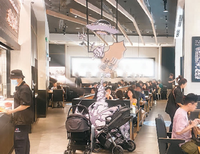 太二酸菜鱼在马来西亚吉隆坡的门店。王 明摄