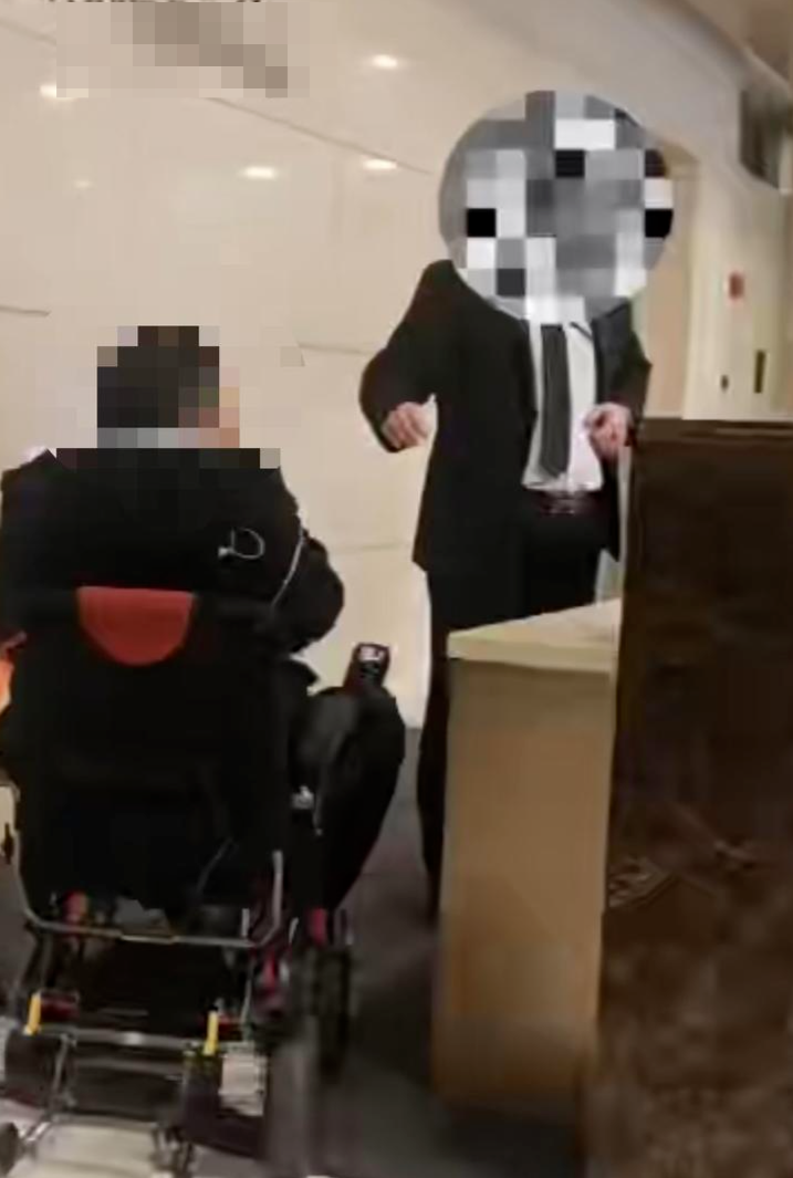 ▲王玄与大厦保安发生争执 视频截图