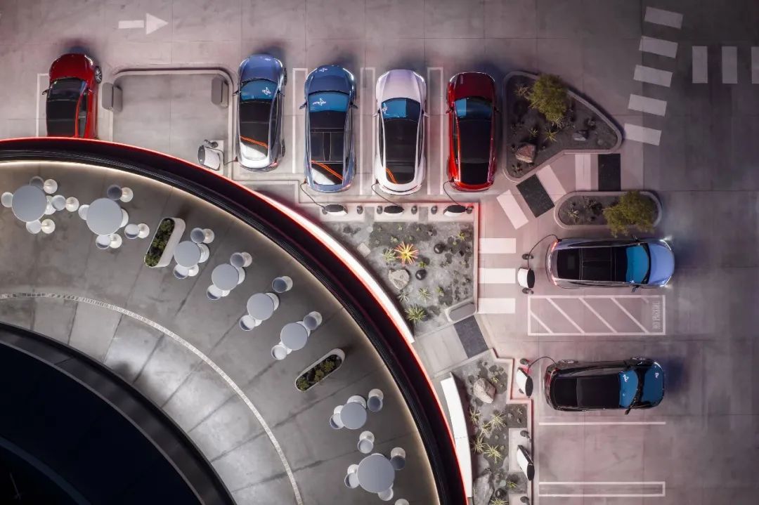 特斯拉开了家未来餐厅:机器人送来爆米花,我递钱包