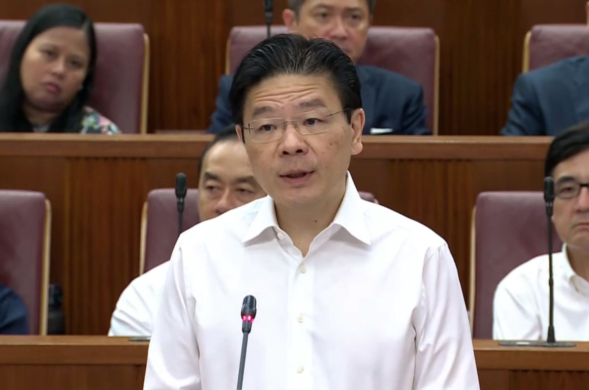 新加坡总理黄循财8日就美加征关税一事发表讲话。 新加坡《海峡时报》