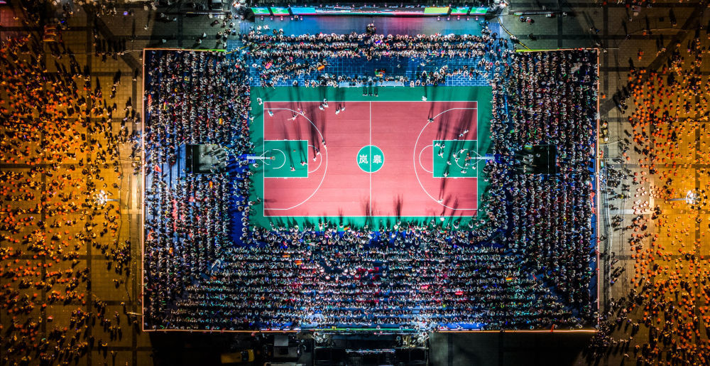 图为贵州台盘1936代表队对阵岚皋南宫山代表队表演赛现场。屈兰平 无人机图片