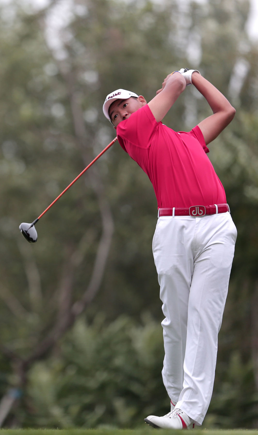 2013年9月9日,香港队选手黑纯一在比赛中。当日,在辽宁省沈阳市进行的第十二届全运会高尔夫球男子团体比赛中,香港队最终以851杆的总成绩夺得亚军。新华社记者姚剑锋摄