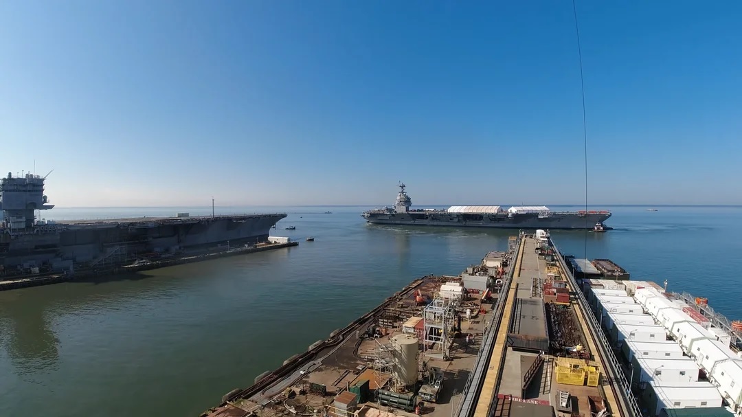 9月29日,“肯尼迪”号被拖到不远处的詹姆斯河河面上180度掉头,进行“推进系统测试”