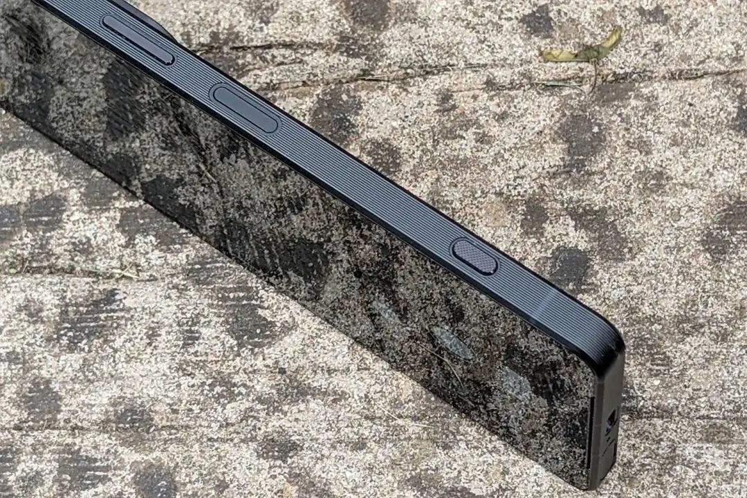 iPhone 上的拍照键:既不快捷,也不方便