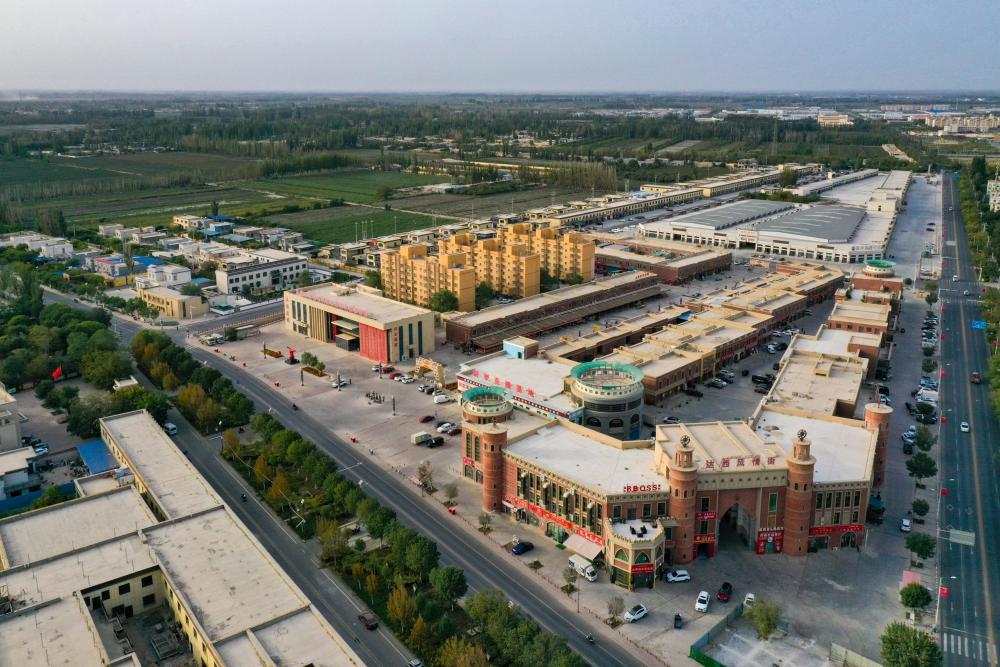 这是9月18日拍摄的新疆巴音郭楞蒙古自治州尉犁县达西村(无人机照片)。