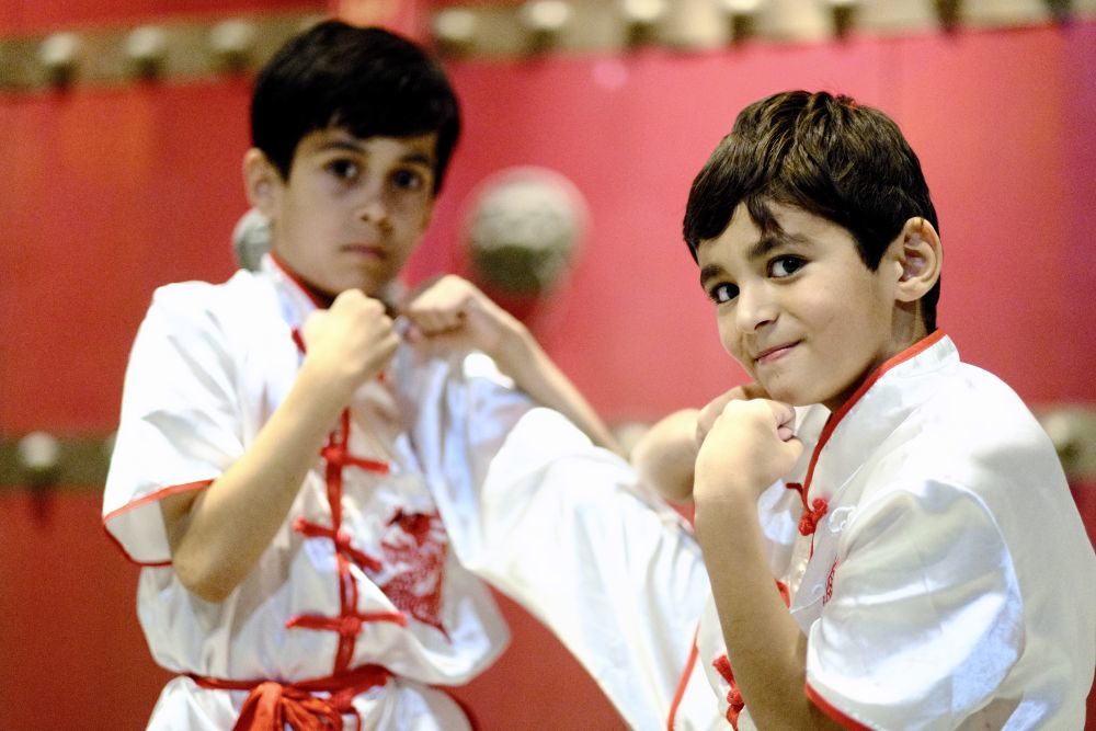 2024年6月11日，在塔吉克斯坦首都杜尚别，爱好中国武术的当地儿童参加塔吉克斯坦民族大学孔子学院的武术表演排练。新华社记者 郑开君 摄