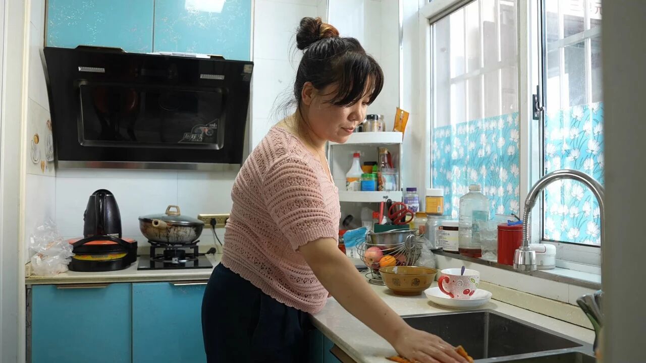 在新家的樊吴平。