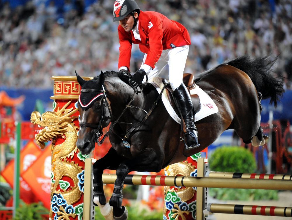 2008年8月21日，北京奥运会马术场地障碍个人赛决赛在香港沙田奥运马术比赛场举行。新华社记者 卢炳辉 摄