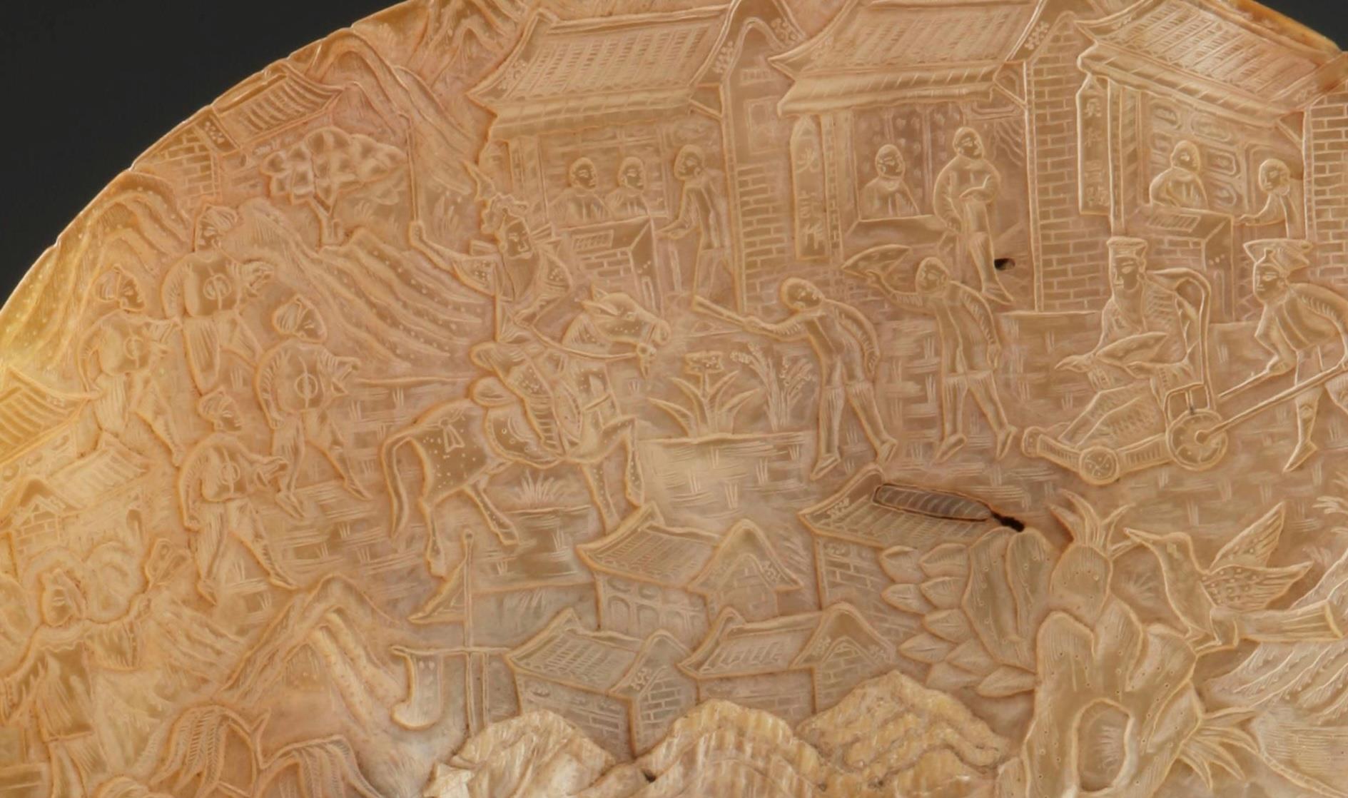 刻在半个贝壳上的“逛街小记”