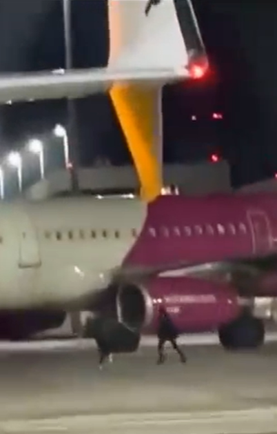 在德国错过登机,两男子神操作:砸玻璃、闯安检,跑上停机坪挥手拦截滑行飞机