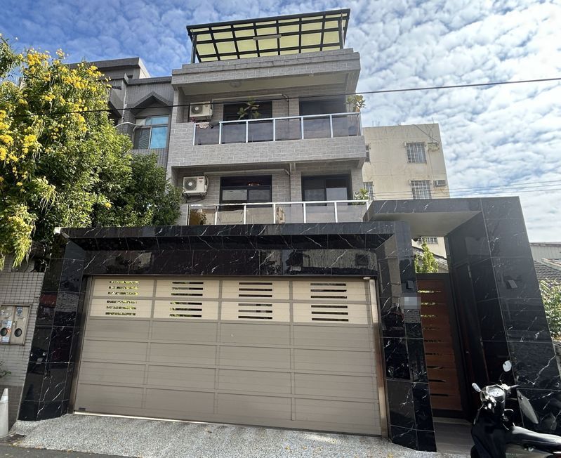 “禾亚国际有限公司”登记地址,外观看上去仅为一栋带院私宅 台“联合新闻网”