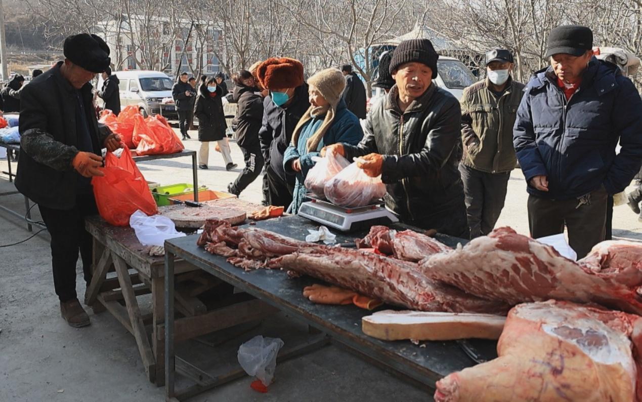 尉庆友的猪肉摊