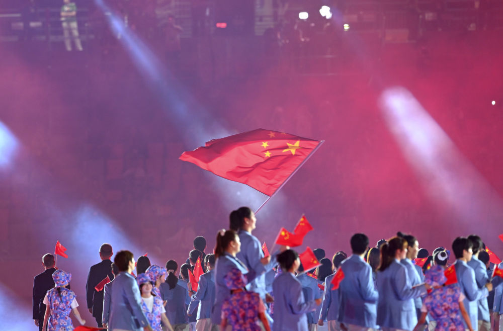 9月19日，第20届亚洲运动会开幕式在日本名古屋举行，中国体育代表团在开幕式上入场。新华社记者 刘磊 摄